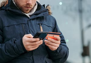 man with debit card